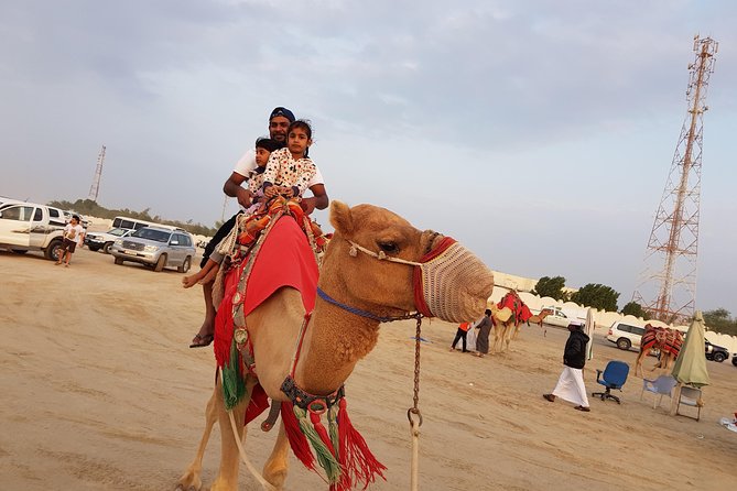 4 Hour Desert Safari, Camel Ride & Inland Sea Beach - Camel Ride and Sandboarding: Short, Fun, and Worth the Go