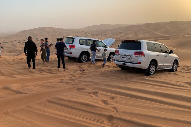 7-hour Small Group 4x4 Desert Safari Tour with Buffet Dinner in Dubai - Sandboarding and camel riding: included options that vary in quality