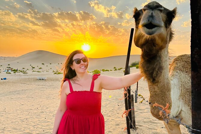 Abu Dhabi: Evening Desert Safari with Camel Ride, BBQ & Live Show - Dune bashing and the camel farm: the part that turns heads