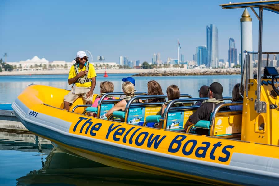Abu Dhabi: Guided Speedboat Sightseeing Tour - Your guide and the photo-stop rhythm that keeps it fun