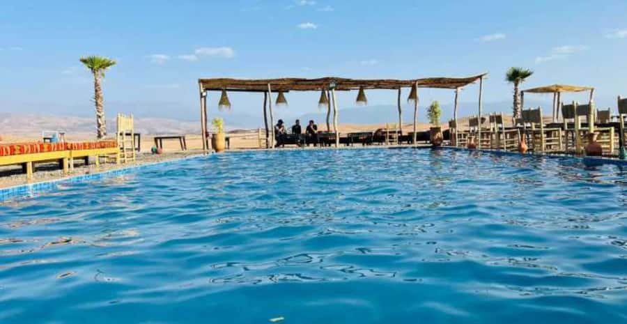 Agafay Desert Day: Quad Bike, Lunch & Swim Adventure - Camel ride through Agafay: short, scenic, and good for photos