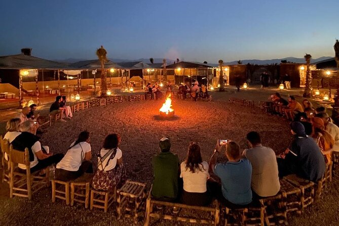 Agafay Desert Package: Quad, Camel Rides & Dinner Show or Lunch - Camel ride at sunset: rocky desert calm and Atlas Mountain photos