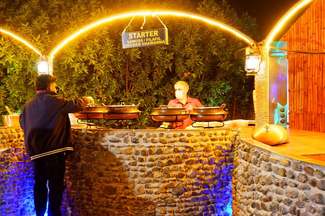 Al Madam Red Sand Safari with BBQ Dinner & Traditional Show - Camp Time That Fits a 7-Hour Evening: Toilets, Sand Boarding, and Henna