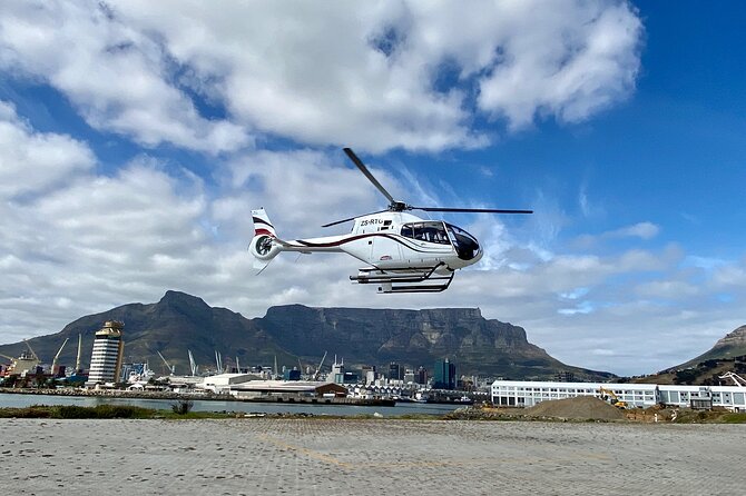 Cape Town: 25min Helicopter Flight with Complimentary Boat Cruise - Getting set up at the V&A Waterfront helipad (and what to expect on board)
