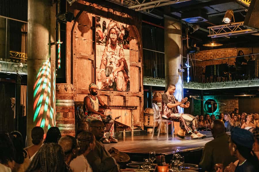 Cape Town: African Dinner, Drumming Experience with Transfer - The table show: Mali puppets, singers, dancers, and why it works