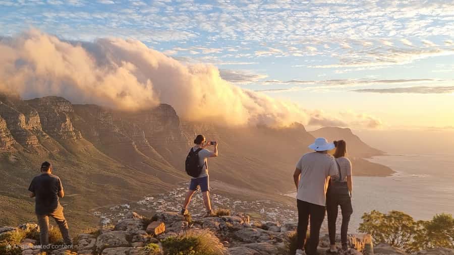 Cape Town: Lion's Head Sunrise or Sunset Guided Hike - The hike in the dark: head torches, scrambling, and where guides earn their fee