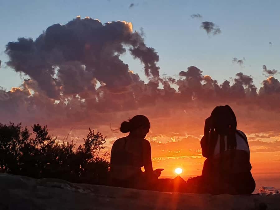 Cape Town: Lion's Head Sunrise or Sunset Hike - Summit time: Table Mountain, the Twelve Apostles, and the 360-degree payoff