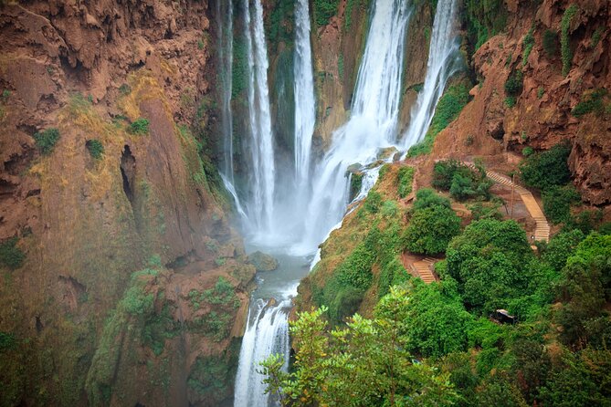 Day Trip to Ouzoud Waterfalls with Guide and Boat Trip - Exploring the falls: the guided 2-hour walk and monkey photo moments