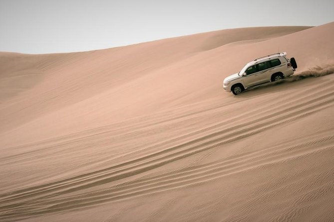 Desert Combo safari, Camel ride, Quad Bike and Dune Bashing(ALL INCLUSIVE) - Sealine Beach area time: where the day’s energy starts
