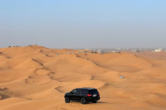 Desert safari adventure with BBQ dinner - Pickup, ride comfort, and how the shared group changes things