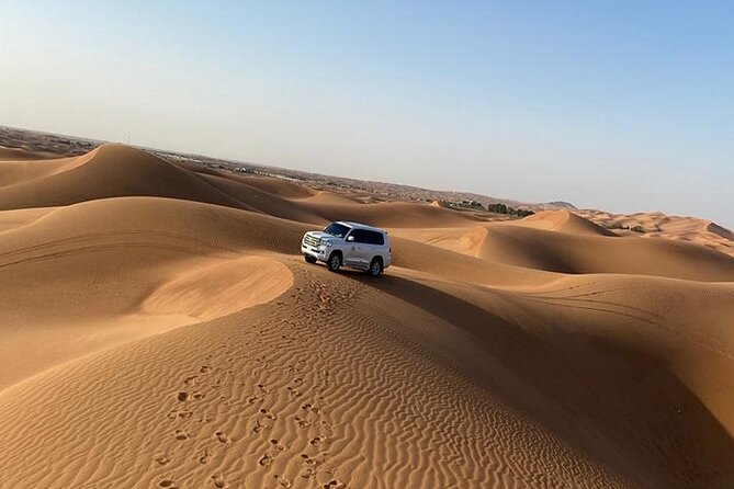 Desert Safari Dubai - RAH Desert Camp: camel ride, BBQ buffet, and live entertainment