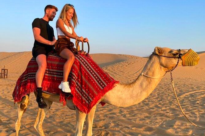Desert Safari Dubai Tour with Dune Bashing, Camel Ride, & BBQ - Getting from Dubai to the dunes: pickup, timing, and shared jeep etiquette