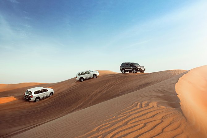Desert Safari Dubai with Dune Bashing, Sandboarding, Camel Ride, 5 Shows, Dinner - How the Evening Desert Safari Works From Al Awir