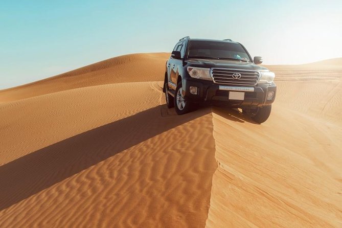 Desert Safari Dubai with Dune Bashing, Sandboarding, Camel Ride, 5 Shows, Dinner - The Show Schedule and Bedouin Dinner: Fire, Performance, and Food