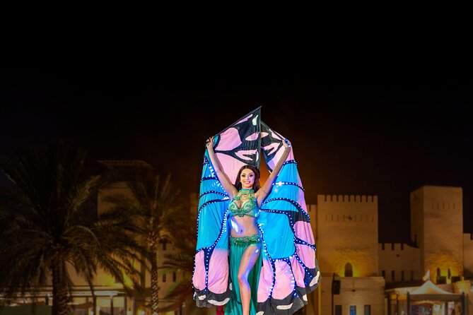 Desert Safari with Dune Bashing and Dinner In Dubai - The shows: belly dance, Tanoura, fire, and a lot more