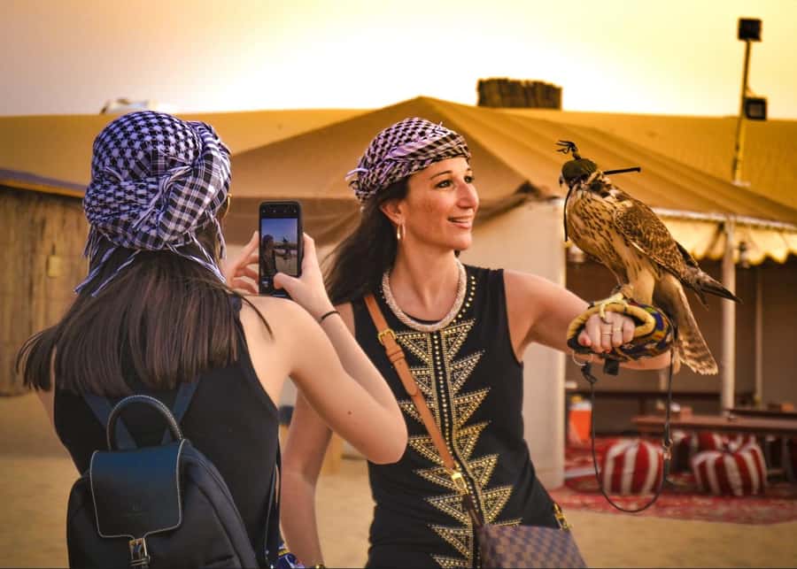 Doha: ATV Quad Bike and Buggy Desert Safari with Camel Ride - Bedouin hosts: camels, falcons, and a calmer pace