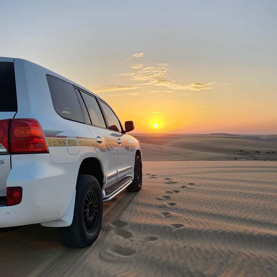 Doha: Desert Safari, Adventure, Sandboarding and Camel Ride - Dune bashing in a Land Cruiser: thrilling, but built around control