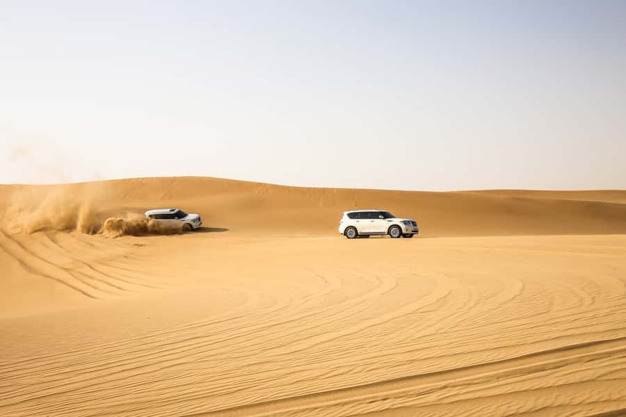 Doha: Desert Safari Dune Bashing, Sandboarding, & Camel Ride - Optional sandboarding: free, but treat it like a sport