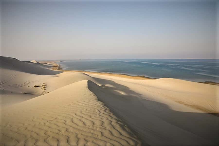 Doha: Desert Safari Dune Bashing, Sandboarding, & Camel Ride - Inland Sea time: the cool photo stop that feels different