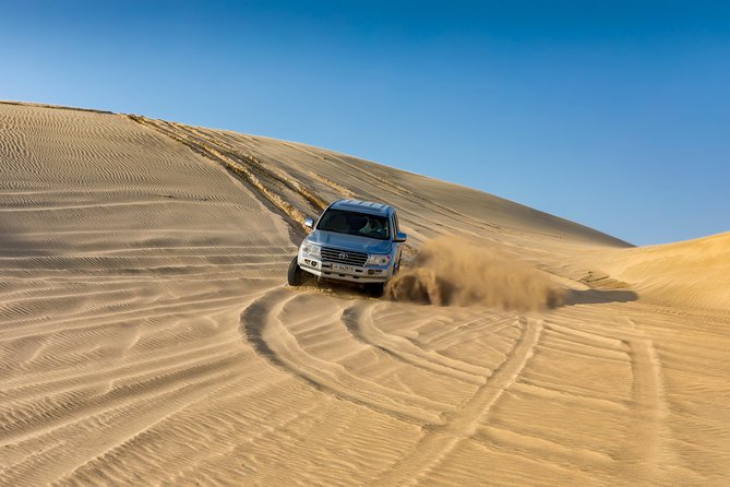 Doha Desert Safari: Dunebashing, Camel, Sandboarding & Inland Sea - Group size: you’ll feel it, but it’s not chaotic