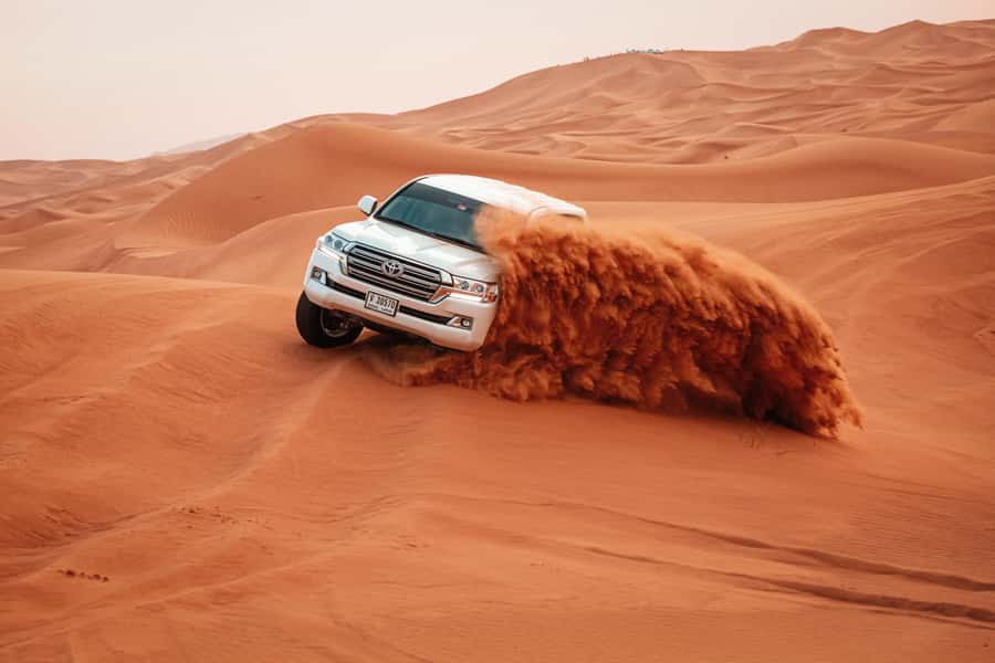 Doha: Desert Safari, Sandboarding, Dune Bashing & Inland Sea - Sandboarding at the Inland Sea Stop: Fun, Fast, and Not Just for Athletes