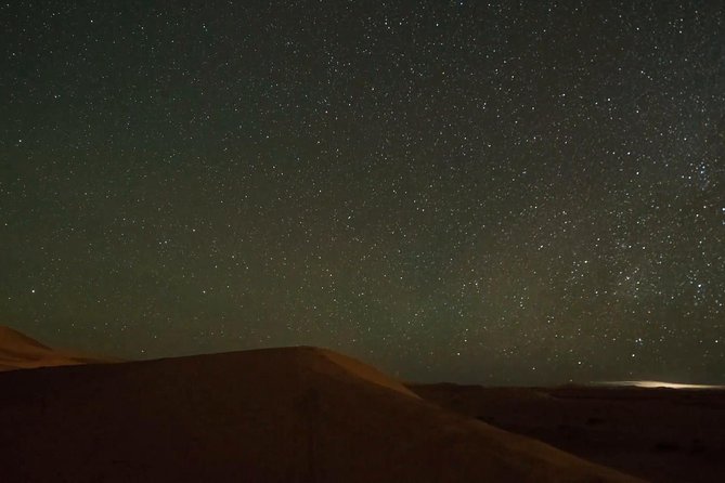 Doha Night Desert Safari Camel Ride Dune Bashing with Transfer - Sealine Beach camel camp: stars, calm, and the short camel ride option