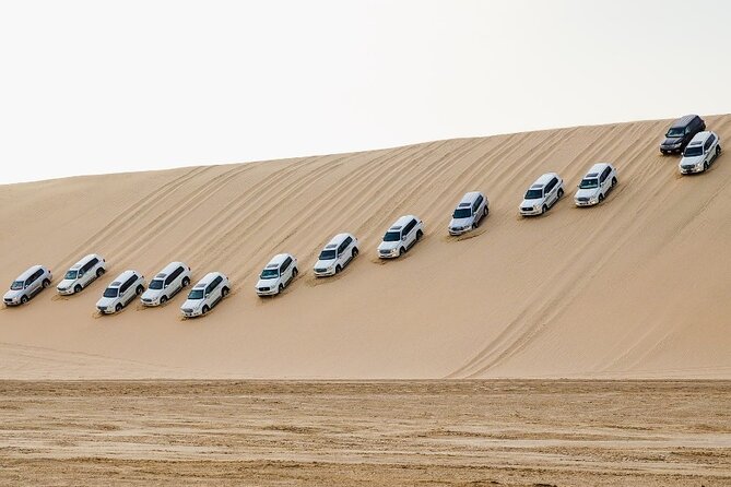 Doha: Private Half Day Desert Safari Tour in Qatar - Inland Sea (Khor al Adaid): Desert Dunes Meet Calm Water