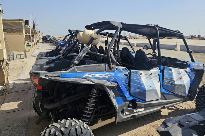 Doha Qatar ATV Quad Bike Buggy Dune Bashing and Camel Ride - Sealine Beach quad biking or buggy time: the “learning the sand” phase