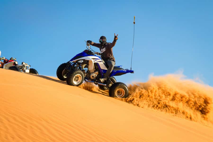 Doha: Quad Bike, Dune Bashing, Camel Ride & Inland Sea Tour - Sandboarding and the small window of fun after the adrenaline