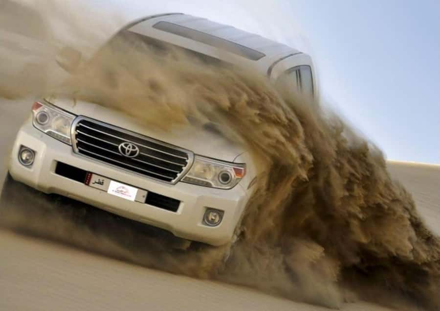 Doha: Safari, Camel Ride, Sandboarding and Inland Sea Tour - Doha Desert Dunes and the Inland Sea in One Clean 4-Hour Block