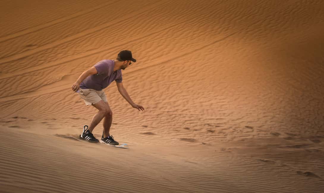 Doha: Sunset Desert Safari, ATV, Camel Ride and Sandboarding - Camel Ride Stop: Short, Sweet, and Photo-Friendly