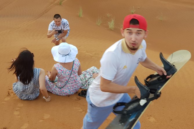 Dubai 4x4 Desert Safari, Quad Bike, Camel Ride & BBQ Dinner - Al Royal Desert Camp: Fire, Tanoura, and Henna Moments
