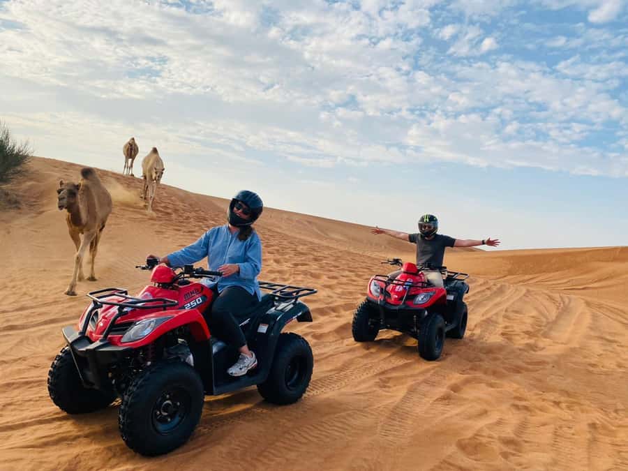 Dubai: Adventure Quad Bike Safari, Camel Ride & Refreshment - Hotel pickup and the trip to the dunes: comfort first