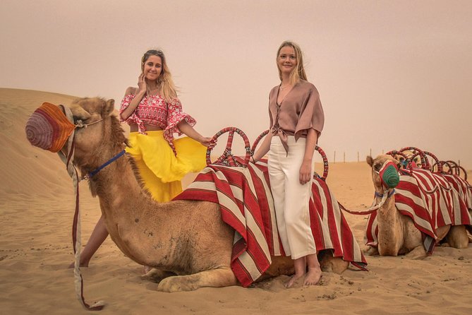 Dubai: Adventure Quad Bike Safari, Camel Ride & Refreshments - Sandboarding: the short lesson that turns into a mini workout