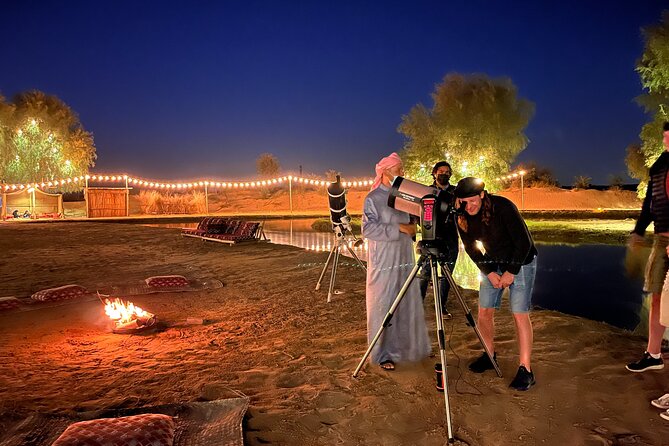 Dubai: Al Marmoom Oasis Vintage Safari: Camels, Stargazing & Meal - Bedouin Village welcome: gahwa, sweets, and camel caravan time