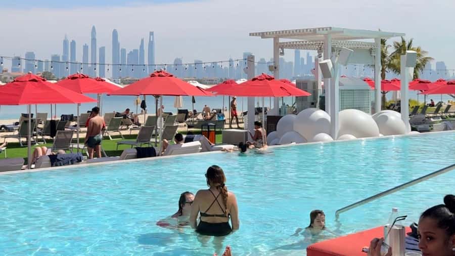 Dubai: Beach Day on the Palm with Skyline Views - What the day feels like: settle in, then swim in warm Persian Gulf water