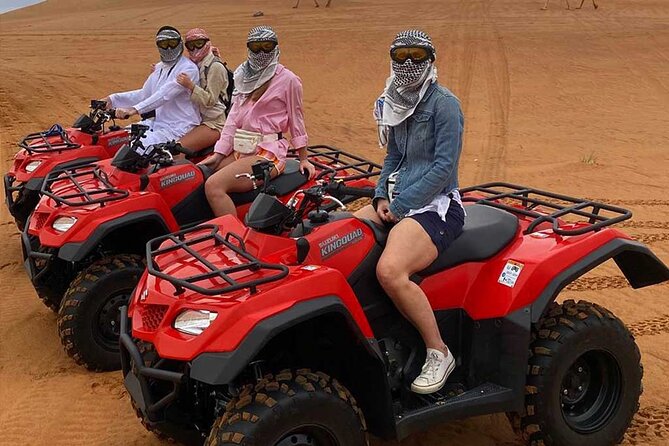 Dubai: Buggy Dune Bashing, Sand Boarding, Camel Ride & Show - The Bedouin camp experience: BBQ dinner, belly dancing, Tanoura, and henna