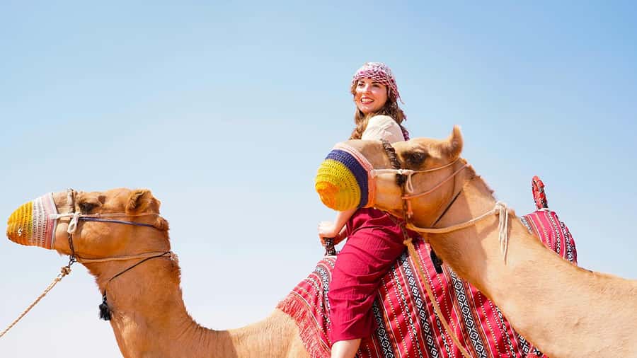 Dubai: Desert Camel Ride with Live Shows & BBQ Buffet Dinner - Dinner under the stars: BBQ buffet plus the dance show lineup