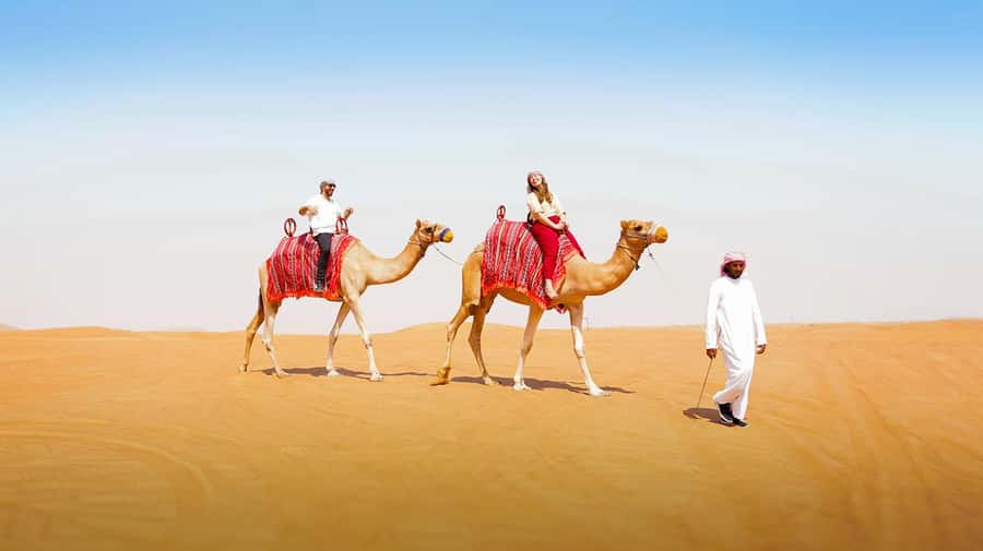 Dubai: Desert Camel Ride with Live Shows & BBQ Buffet Dinner - Getting picked up in Dubai without losing half the evening