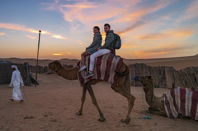 Dubai Desert Journey: Red Dunes Safari with BBQ in Bedouin Camp - Sandboarding and the sunset photo stop that makes the whole day click