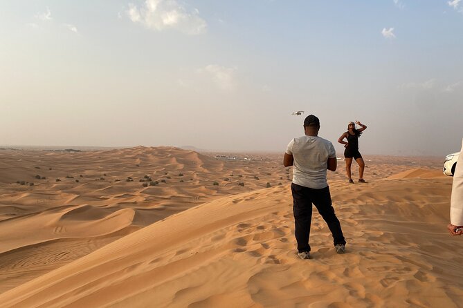 Dubai Desert Safari, Camel, Live BBQ & Shows (Private 4x4 Car) - The evening Bedouin camp at Al Aweer: BBQ, camel ride, and henna