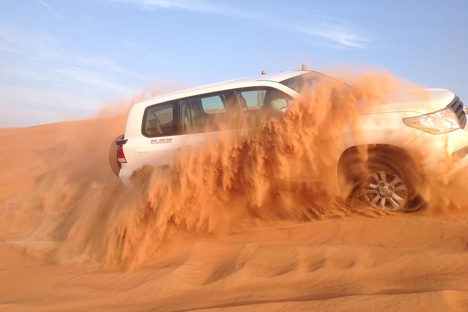 Dubai: Desert Safari, Camel Ride, Show & Optional Dinner - Sandboarding and extras: small time, big payoff