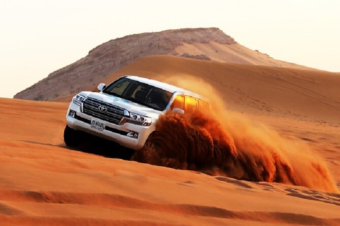 Dubai Evening Desert Safari With BBQ Dinner at Arabian Heritage - Getting picked up and heading into the desert by 4x4
