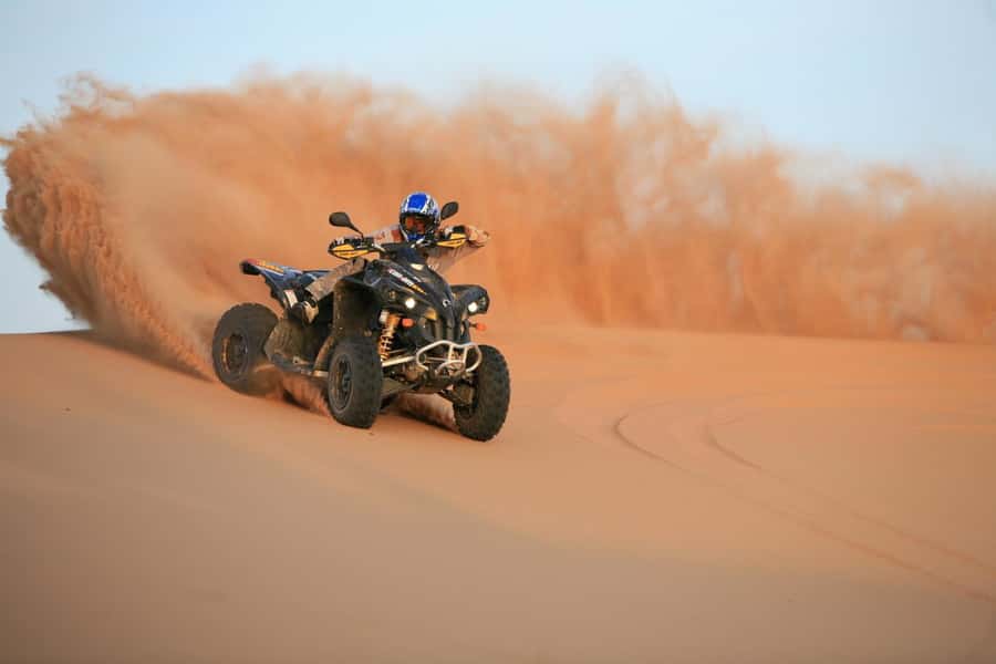 Dubai: Evening Tour with Quad Biking, Camel Ride, and BBQ - Lahbab dune bashing and sandboarding: the thrill you came for