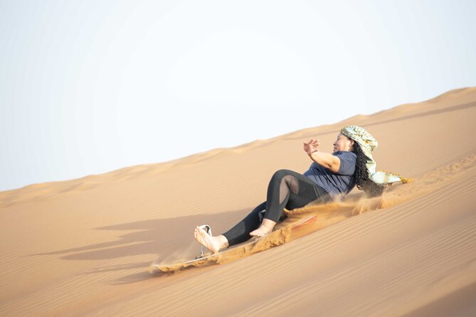 Dubai Half-day Red Dunes bashing with Sandboarding, Camel &Falcon - Who This Morning Safari Fits Best
