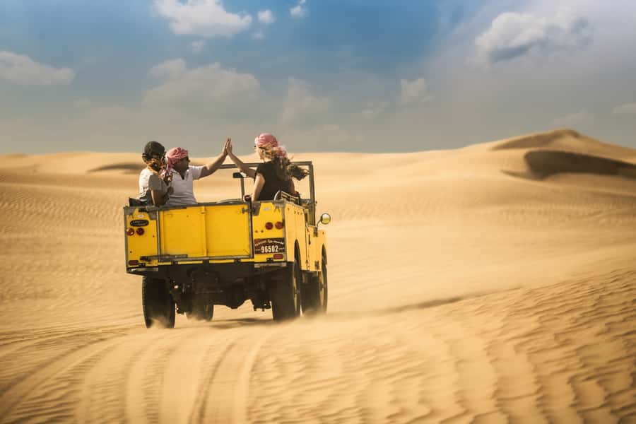 Dubai: Heritage Safari in Vintage Land Rover with Dinner - Bedouin camp at a private royal retreat: coffee, bread, henna, camels