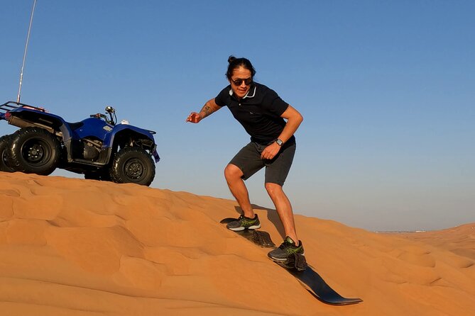 Dubai: Jeep Desert Safari, Camel Ride, and Quad Bike Tour - Four-in-one fun, with door-to-door help from Dubai