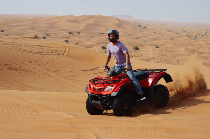 Dubai: Jeep Desert Safari, Camel Ride, and Quad Bike Tour - Quad biking in Lahbab: helmets, safety briefing, and throttle time