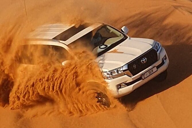 Dubai: Jeep Desert Safari, Camel Ride, and Quad Bike Tour - Sandboarding: your legs get a workout, and your photos get a headline