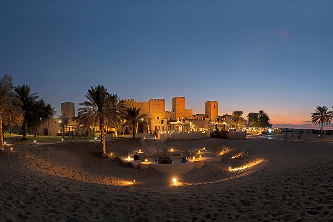 Dubai: Luxury Desert Fortress Dinner, Camel Ride & Live Shows - Belly dancing, Tanoura, and fire show under desert night skies